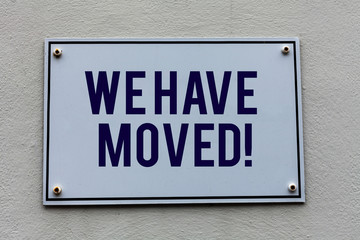 Obraz premium Conceptual hand writing showing We Have Moved. Concept meaning To go from one residence or location to another Relocate
