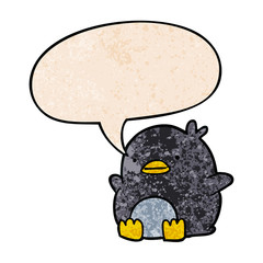 cute cartoon penguin and speech bubble in retro texture style