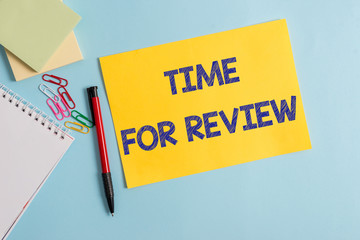 Writing note showing Time For Review. Business concept for review of a system or situation in its formal examination Plain cardboard and writing equipment placed on pastel colour backdrop