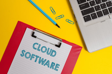 Word writing text Cloud Software. Business photo showcasing Programs used in Storing Accessing data over the internet Open laptop clipboard blank paper sheet marker clips colored background