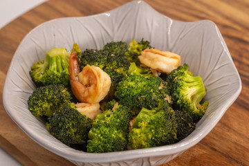 Close up homemade  Fried broccoli with shrimp. (selective focus)