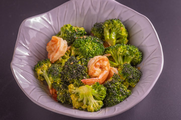 Close up homemade  Fried broccoli with shrimp. (selective focus)