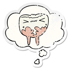 cartoon bad tooth and thought bubble as a distressed worn sticker
