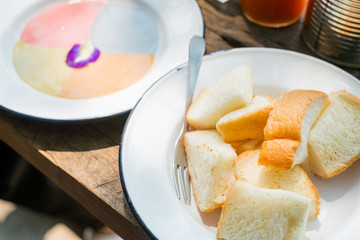 Steamed bread with colourful thai custard