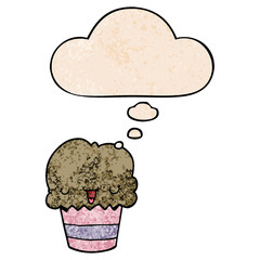 cartoon cupcake with face and thought bubble in grunge texture pattern style