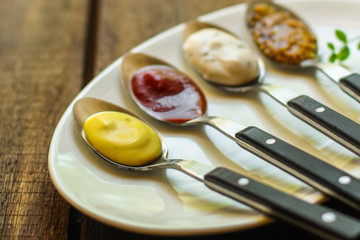 sauces, portion serving (ingredient). Top view. copy space