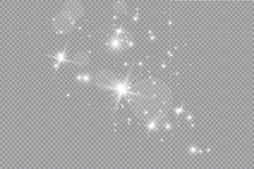 The dust is yellow. yellow sparks and golden stars shine with special light. Vector sparkles on a transparent background. Christmas light effect. Sparkling magical dust particles.