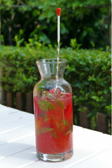 A bowl of natural lemonade made from strawberries and mint.