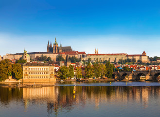 Fototapeta na wymiar The view of Prague castle, St. Vitus Cathedral and the Vltava river. Prague, Czech Republic