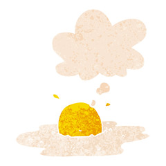 cartoon fried egg and thought bubble in retro textured style