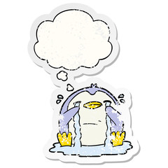 cartoon crying penguin and thought bubble as a distressed worn sticker