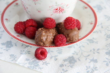 raspberries and chocolate in a bowl