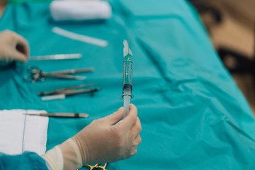 Medical footage with syringe on hand