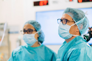 Team of surgeons operating in the hospital