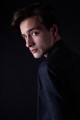 Fototapeta premium Young caucasian adult posing in the studio