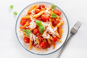 italian penne pasta with tomatoes parmesan basil