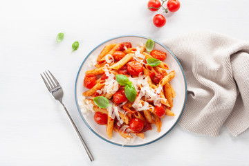 italian penne pasta with tomatoes parmesan basil