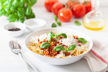 spaghetti bolognese with basil and parmesan, italian pasta