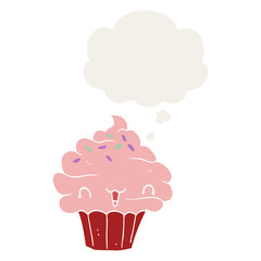 cute cartoon frosted cupcake and thought bubble in retro style