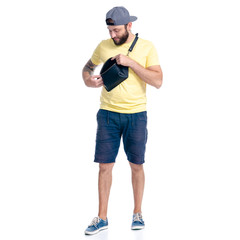 Man in shorts and cap standing happiness smiling on white background isolation