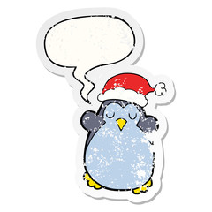 cute christmas penguin and speech bubble distressed sticker