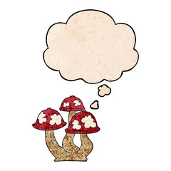 cartoon mushrooms and thought bubble in grunge texture pattern style