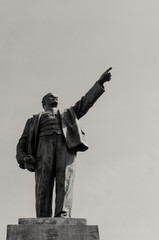 Fototapeta premium The sculpture of Lenin indicates with his hand the path - the symbol of totalitarianism.