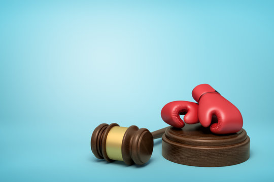 3d rendering of red boxing gloves on round wooden block and brown wooden gavel on blue background