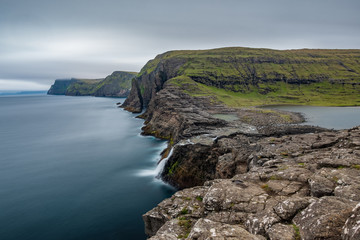 Bosdalafossur waterfall and coastline long exposure, Faroe Islands