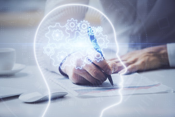 Man with multi exposure brain theme icons.