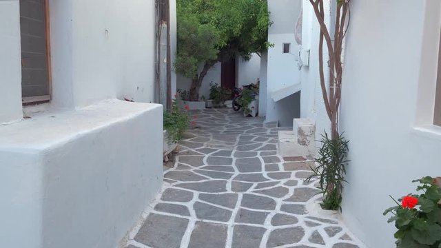 Walking in Naousa street on Paros island, Greece