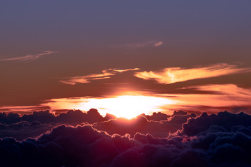 sunset above clouds