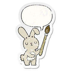 cartoon rabbit and paint brush and speech bubble distressed sticker