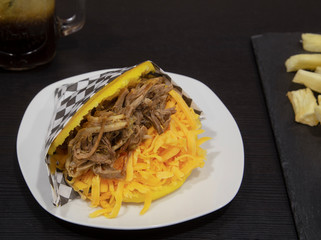 Venezuelan food dish, hairy Arepa of chicken meat