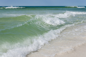 Tropical ocean beach landscape scene. Beautiful scenic tourist travel destination location. Relaxing Gulf Coast seaside beaches.