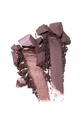 Shiny smear of brown eyeshadow isolated on white