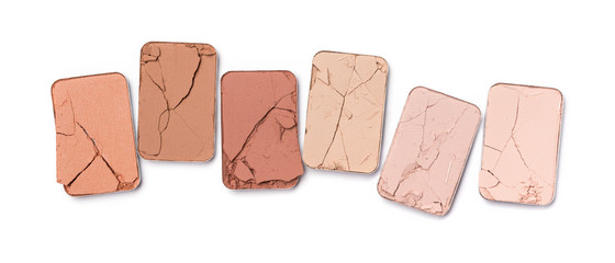 Pink, beige and coral color of crushed eye shadow for makeup