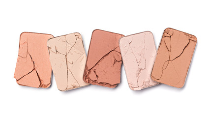 Pink, beige and coral color of crushed eye shadow for makeup