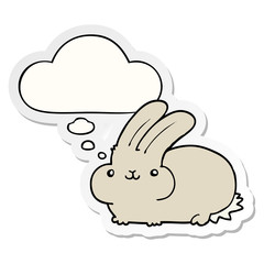cartoon rabbit and thought bubble as a printed sticker