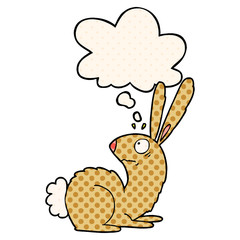 cartoon startled bunny rabbit and thought bubble in comic book style