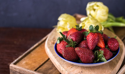 fresh, juicy strawberries in plate,