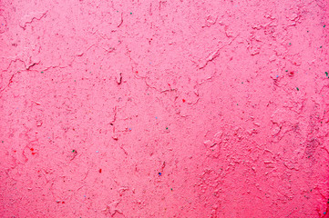 Texture of iron metal painted bright paint peeling paint old battered scratched cracked ancient rusty metal sheet wall with corrosion. The background