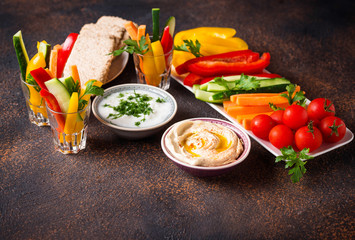 Snacks bar. Vegetables sticks and hummus