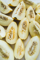 A group of brightly lit melon slices.