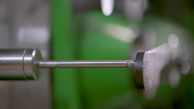 Steel metalworking machine parts rotating while work.
