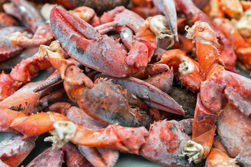 cooked lobster claws closeup background