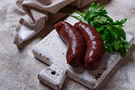 Homemade uncooked black pudding sausages