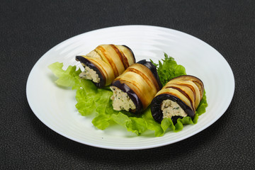 Stuffed eggplant roll with cheese and herbs