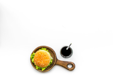 Burger and drink for national american kitchen concept on white background top view mock up