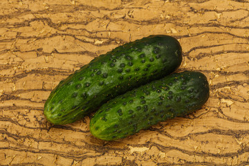 Ripe fresh green two cucumbers